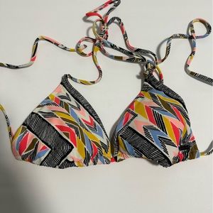 TWO Volcom bathing suit tops. Size small